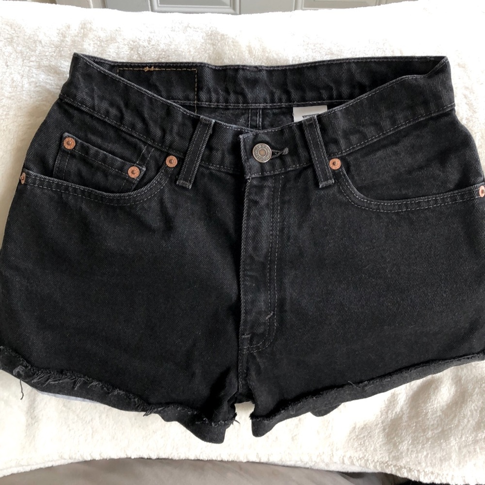 Vintage high waisted black Levis jean shorts from Aritzia
